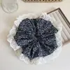 Arte retro blanco y negro pequeñas flores intestino grueso anillo para el pelo alta sensación temperamento nicho encaje cuerda para el pelo flor para la cabeza nueva venta al por mayor