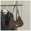 Primavera 2026 Nuevo Bolso de Axila Texturizado Vintage de Nicho Bolso Cruzado para Mujer Bolso de Empanada de Alto Valor Bolso de Hombro Simple