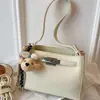 2026 Design de Nicho Bolsa Kelly Bolsa de Trabalho de Alto Padrão para Mulheres Bolsa de Ombro Simples Nova Bolsa Transversal Pequena Bolsa de Mão