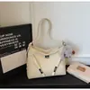 Bolso Versátil de Nicho para Mujer 2025 Nuevo Modelo Textura de Alta Calidad Bolso de Hombro Cruzado Súper Popular Bolso Tote de Gran Capacidad para el Trabajo