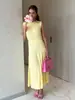 Vestido transfronterizo europeo y americano 2026 primavera-verano nuevo estilo cuello redondo sin mangas tejido texturizado de punto vestido midi plisado