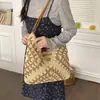 Resort de Playa Junto al Mar Bolso Tejido de Paja para Mujer 2026 Nuevo Versátil para el Trabajo Diario Bolso de Hombro Único Bolso Tote Artístico de Nicho