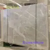 Material de Pedra Mármore Cinza Yun Duola Pode Ser Enviado para Amostras Grátis e Pode Ser Processado com Vários Acabamentos de Superfície, como Superfície Polida à Máquina, Superfície Leather, etc.