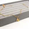 Moda europea y americana 26 letras collar de acero inoxidable oro plata cadena de clavícula de lujo ligero joyería de acero de titanio venta al por mayor