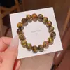 Pulseira de miçangas com senso de design avançado, pulseira de pérolas de nicho de luxo leve, temperamento versátil feminino, pulseira de rede vermelha, joias por atacado