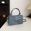 Outono de 2026 Nova Bolsa Transversal Estilosa Texturizada Quadrada Pequena Retrô Bolsa de Ombro Simples Versátil Feminina Tendência Atacado Bolsas Femininas
