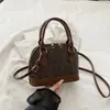 Bolsa Nova Outono/Inverno 2026 Bolsa Concha Estilo Retrô Luxo Leve Moda Tendência Versátil Bolsa de Ombro Transversal Bolsa Feminina