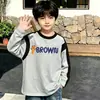 Camiseta de manga larga de algodón puro para niños, moda de primavera y otoño, capa base para niños, cuello redondo de dibujos animados, top holgado estampado versátil, camiseta moderna