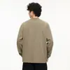 Camiseta de Manga Larga para Hombre 2026 Otoño Nueva Cuello Redondo Holgada Casual Bolsillo Color Sólido Camiseta Versátil Moderna Algodón