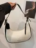 Bolsas Coreanas de Nicho de Luxo 2026 Novo Modelo Bolsa Hobo Meia-Lua Bolsa Bolinho Bolsa de Ombro/Axila de Couro Moda