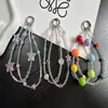 Corrente de celular original com miçangas de estrela na cor transparente, pingente de celular com miçangas para pulso, design de nicho, corrente de celular de alta qualidade