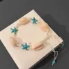 Pulsera de Conchas de Playa Natural Transfronteriza Europea y Americana para Mujer Pulsera de Estilo Bohemio Resort Tobillera de Cuerda Trenzada con Estrella de Mar Azul