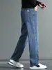 Venta al por mayor de jeans gruesos con forro polar para otoño e invierno para hombre, pantalones de pierna ancha de cintura alta, pantalones casuales de negocios rectos holgados y elásticos para hombre