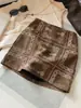 Falda Corta de Gamuza Bordada Jacquard Vintage para Mujer, Nueva Otoño de Cintura Alta Adelgazante Anti-Exposición Línea A