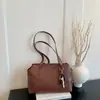 Otoño 2026 Nuevo Estilo Coreano Moderno Sencillo Bolso de Axila Color Sólido Bolso de Hombro para Viajes Cotidianos Bolso de Mano Vintage