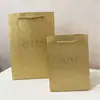 Ventas Directas de Fábrica Cola de Fénix Tarjeta Dorada Bolsa de Regalo Caja de Joyería Bolsa de Papel Bolsa de Regalo de Boda Bolso de Mano de Boda
