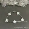 Pulsera delgada Fanjia CNC versión de alta gama, trébol de cuatro hojas de nácar blanco, cinco flores, color dorado claro, chapado grueso en oro de 18k para mujer