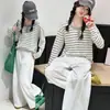 Top Rayado para Niñas Transfronterizo 2026 Nueva Moda Primavera Infantil Elegante Camiseta Básica sin Hombros para Niños Mayores Camiseta de Algodón Puro