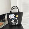 Bolso de lona para estudiantes, bonito bolso de mano japonés para viajeros, bolso de almuerzo, diseño de nicho, bolso informal, novedad de 2023