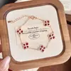 Collar Colgante de Trébol de Cuatro Hojas Rojo Estilo Nacional para Mujer, Lujo Ligero, Gama Alta, Elegante, Estilo Ins, Corindón Rojo al por Mayor
