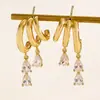Pendientes de borlas irregulares de moda con incrustaciones de circonita para mujer, de venta caliente transfronteriza europea y americana, con pendientes de remaches apilados para mujer