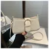 Bolso tipo baguette texturizado de alta calidad para mujer, nuevo estilo verano 2026, elegante bolso retro para hombro o axila, bolso cruzado versátil y moderno
