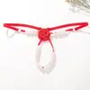 En nombre de la exportación de pantalones T de masaje de perlas sexy europeos y americanos, tanga rosa para mujer, cintura baja, transparente, tentación 162