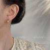 Pendientes de moda para mujer, con aguja plateada, sencillos, geométricos, de arco hueco, de nicho, de alta gama, al por mayor