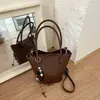 Bolso casual elegante de gran capacidad transfronterizo, nuevo bolso de hombro de moda casual de otoño 2026, bolso tipo cubo para commuting