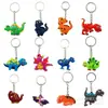 Set de Artículos de Fiesta de Dinosaurios de Dibujos Animados Regalo de Cumpleaños para Niños Bolsas de Regalo Sellos Llaveros Pulseras de Bofetada Combinación de Pegatinas
