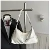 Bolsa de Grande Capacidade para Deslocamento Transfronteiriço Feminina Outono 2026 Nova Versátil Bolsa Transversal Moda Única Ombro Axila Bolsa Tote