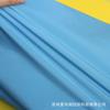 Punto azul 75D resorte mecánico giratorio película impermeable poncho impermeable para niños tela de ropa de asalto de poliéster