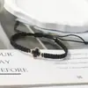Pulsera tejida de nudo plano de trébol de cuatro hojas de venta caliente transfronteriza para parejas y estudiantes, tendencia europea y americana inspirada en la dopamina, joyería al por mayor de fabricante