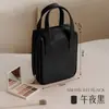 Nova Bolsa de Maquiagem Portátil Pu Transfronteiriça com Aparência Aprimorada, Bolsa Portátil para Armazenamento de Cosméticos, Bolsa de Higiene Pessoal Grande para Viagem
