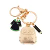 Llaveros personalizados más vendidos transfronterizos, dijes para mochilas, colgantes de aleación para la temporada de graduación, accesorios con temática de campus para las mochilas de los estudiantes