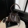 Bolsa de ombro com corrente de nicho para mulheres, nova coleção de outono 2026, bolsa de ombro de alta qualidade e na moda, bolsa transversal versátil tipo almofada