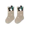 Meias de Bebê Outono Novo Estilo Meias de Algodão Classe a para Meninos e Meninas, Cor Sólida, Sem Costura, Não Apertam, Meias de Cano Médio para Crianças e Bebês