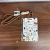 Portatarjetas deslizante Snoopy de comercio exterior, funda protectora linda de gato KT para tarjeta de acceso al campus y de autobús, cordón para tarjeta de acceso al metro