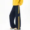 Nuevos Pantalones Casuales para Hombre 2026 para Otoño e Invierno, Marca de Moda de Punto Estilo Americano Pantalones de Pierna Ancha Curvos con Tres Rayas
