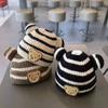 Gorro de bebé de comercio exterior, gorro con protección para los oídos, gorro de lana Maruko para otoño e invierno, gorro cálido súper lindo para niña y niño.