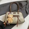 Bolsa Retrô de Luxo 2025 Nova Bolsa Feminina Simples e Versátil Bolsa de Ombro para Trabalho e Deslocamento Bolsa Tote de Grande Capacidade