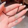 Cadena Corta para Clavícula de Concha de Cristal Negro Hoja de Ginkgo Lujo Accesible Gama Alta Estilo Frío Nicho Collar de Primavera y Verano