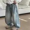 Calça jeans infantil 2026 nova primavera e outono, calça comprida casual com patchwork, modelagem solta e estilosa para meninos