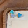 Aretes asimétricos en forma de corazón con goteo de aceite de aguja plateada, dulces y a la moda para el verano, versátiles y de nicho, con un toque de alta gama y exquisito