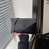 Bolso de mujer estilo sobre de moda transfronterizo, bolso de hombro moderno estilo coreano, bolso cruzado, bolso de axila, estilo casual, 2026, diseño de cadena simple, elegante para mujer