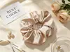 Moderna y de Alta Gama Gomas para el Cabello de Satín con un Diseño Elegante y Brillante de Alta Elasticidad. Suministro al por mayor. Venta directa del fabricante