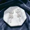 Pendientes Largos con Borlas de Circonita y Lazos Huecos de Lujo Ligero y Gama Alta, Accesorios de Oreja Versátiles de Moda y Estilo