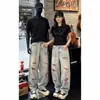 Jeans Rotos Americanos para Hombres y Mujeres Nueva Colección Primavera y Otoño 2026 Pantalones Casuales Rectos Sueltos de Pierna Ancha Pantalones Largos Lavados