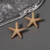 Pendientes de Moda de Venta Caliente Transfronteriza Estilo Playa Vacacional Estrella de Mar Concha Distintivos con Circonita Estilo Simple