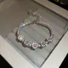 Pulseira de Zircônia Flor Redonda Verde Estilo Europeu e Americano, Sensação de Luxo Leve e de Alta Qualidade, Acessório de Mão Doce e Versátil para Mulheres